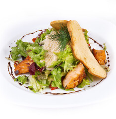 Caesar salad with chicken on a plate