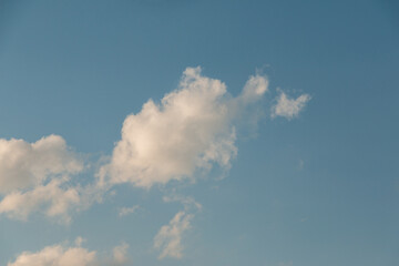 Clouds on the blue sky.