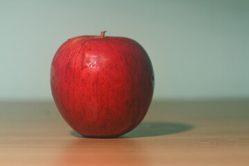 red apple on the table