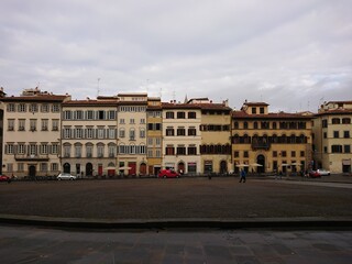 Row of Italian shop houses with variety of facades by the street