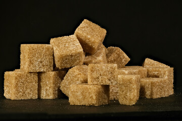 Pile of brown sugar cubes