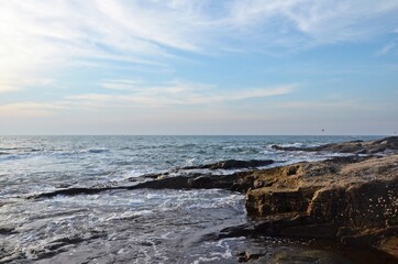 waves crashing on rocks