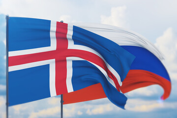 Waving Russian flag and flag of Iceland. Closeup view, 3D illustration.