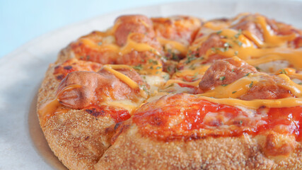 delicious pizza detail on white plate close up view