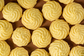 Overhead view of homemade snickerdoodle cookies with a bite missing