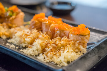 Sushi salmon roll with crispy on plate