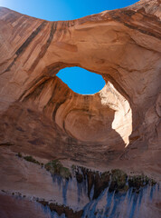 Portrait orientation of Bowtie Arch in Moab Utah