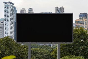 Fototapeta premium Blank black road billboard with Bangkok cityscape background at day time. Street advertising poster, mock up, 3D rendering. Front view. The concept of marketing communication to promote or sell idea.