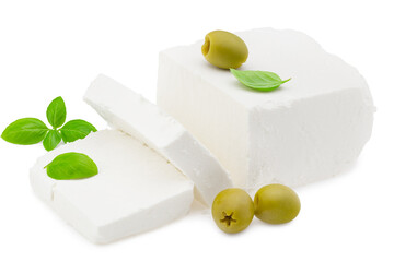 Slices feta cheese with olives and basil isolated on white background. Clipping path and full depth of field