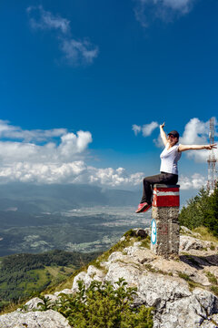 Woman on top of mountain. Happy, active.  Trebevic Mountain Bosnia & Herzegovina 
