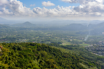 Panoramic view to mountains, tropical forest, Yanoda Park and Sanya city. Rainforest cultural tourism zone Yanoda, Hainan, China.