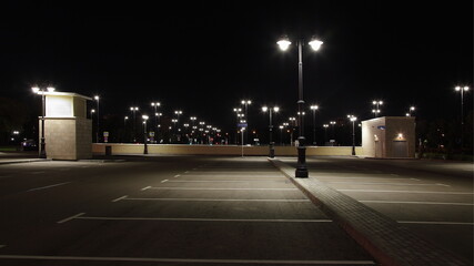 Empty outdoor contemporary Moscow car Parking with streetlights in family children's Park Island of...