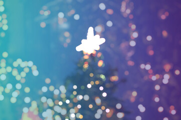 Christmas tree and blurry lights background. Design for your ad, poster, banner