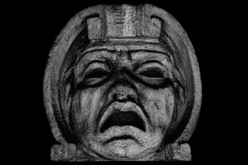 God of fear Phobos (Greek mythology). Ancient statue isolated on black background.