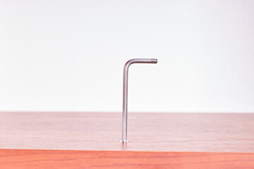 repairman wooden furniture adjusting. housing assistance concept. person using work tool to assembly or fixing furniture. domestic life. diy concept