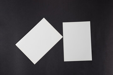Mockup template paper brochures on a black background.
