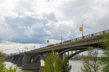 Big bridge over a wide river, October Communal bridge over the Ob River in Novosibirsk, Siberia, Russia. 