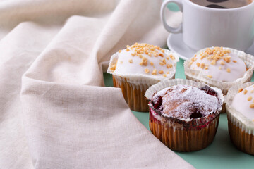 yummy sweet tasty muffin cakes on simple mono color background