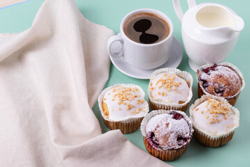 yummy sweet tasty muffin cakes on simple mono color background