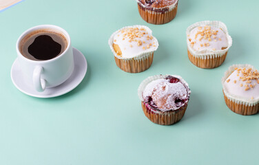 yummy sweet tasty muffin cakes on simple mono color background