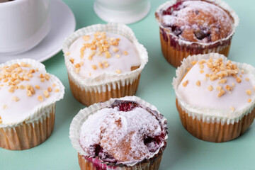 yummy sweet tasty muffin cakes on simple mono color background