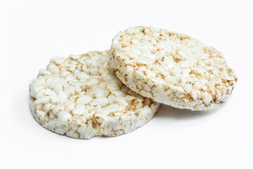 Two pieces of rice cake isolated on white. Dry dietary food