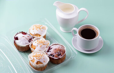 yummy sweet tasty muffin cakes on simple mono color background