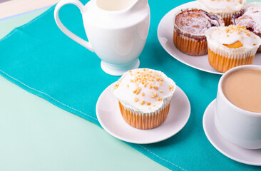 yummy sweet tasty muffin cakes on simple mono color background