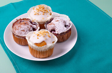 yummy sweet tasty muffin cakes on simple mono color background