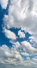 Fantastic clouds against blue sky, panorama