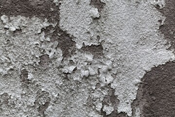 Weathered white color on grey concrete