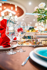 .glass wine glasses on a served table