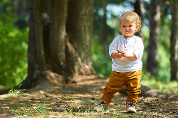 emotional portrait of a child in a white shirt