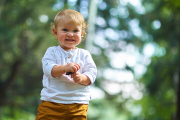 emotional portrait of a child in a white shirt