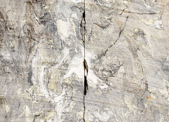 Piece of marble. A rock cut in the wild. Natural stone. Texture