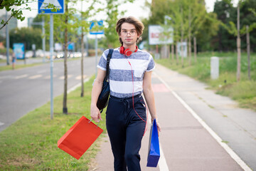 Young gay man shopping