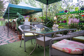 .a table in a street cafe on a summer sunny day
