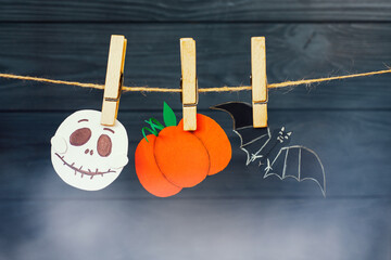 festive garland with Halloween Jack o Lantern pumpkin skull and bat - halloween Trick or Treat decor