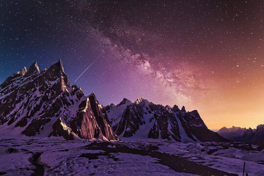Snow mountains with dramatic starry evening galaxy Beautiful HD wallpaper