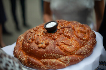 Russian loaf. Wedding tradition bread and salt for the bride and groom. 