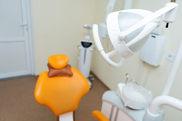Interior stylish modern dentist office in orange style.
