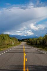 Scenic Road View of Klondike Hwy during a sunny and cloudy day. Taken near Whitehorse, Yukon, Canada.