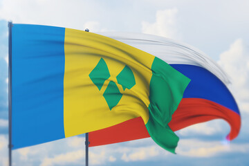 Waving Russian flag and flag of Saint Vincent And The Grenadines. Closeup view, 3D illustration.
