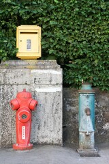 Letterbox, fountain and fire hydrant in France