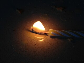 Lit Candle on Plate