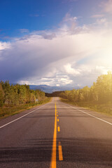 Scenic Road View of Klondike Hwy during a sunny and cloudy day. Taken near Whitehorse, Yukon, Canada.
