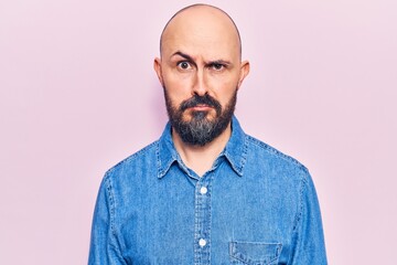 Young handsome man wearing casual clothes skeptic and nervous, frowning upset because of problem. negative person.