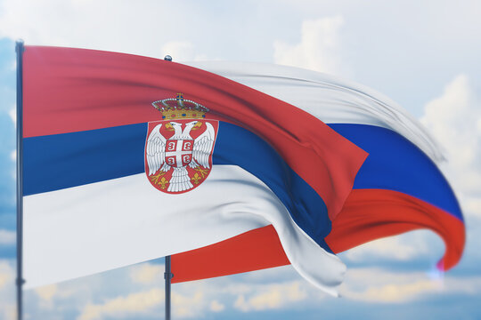 Waving Russian flag and flag of Serbia. Closeup view, 3D illustration.