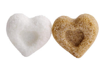 A pair of heart-shaped sugar cubes isolated on white. Interracial relationship metaphor