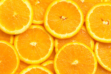 Full frame of fresh orange fruit slices pattern background, close up, high angle view - Powered by Adobe